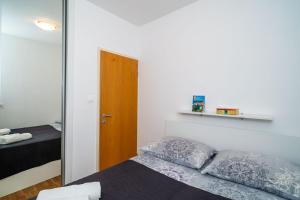Postel nebo postele na pokoji v ubytování Apartment Joky