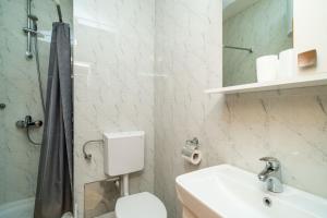Koupelna v ubytování Apartment Joky