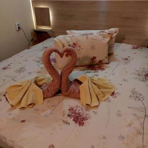 Postel nebo postele na pokoji v ubytování Guesthouse Pumpalovi