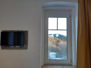 Televízia a/alebo spoločenská miestnosť v ubytovaní Resort Abertham - apartment Vanessa