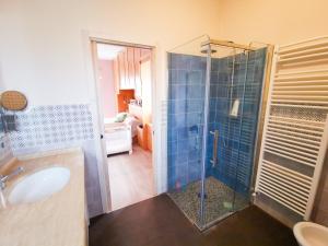 a bathroom with a shower and a sink at Historic family house in Montefiascone