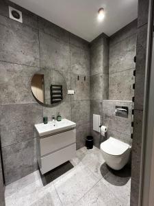 Kúpeľňa v ubytovaní Apartament D2 Karpatia - 5D Apartamenty