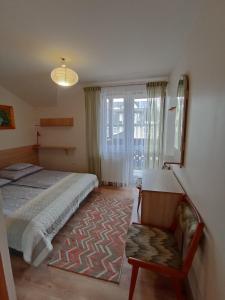 Postel nebo postele na pokoji v ubytování Szarotka Pienińska