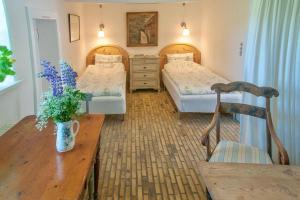 Postel nebo postele na pokoji v ubytování Lillemøllens bed & breakfast