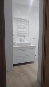 Kúpeľňa v ubytovaní Apartamenty Leśne Zacisze