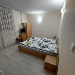 Postel nebo postele na pokoji v ubytování Guesthouse Pumpalovi