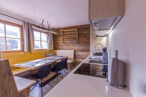 Kuchyň nebo kuchyňský kout v ubytování Appartamenti Residence Pars
