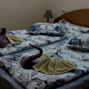 Postel nebo postele na pokoji v ubytování Guesthouse Pumpalovi