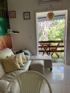 Khu vực ghế ngồi tại Apartamento Praia do Forte +36 ảnh