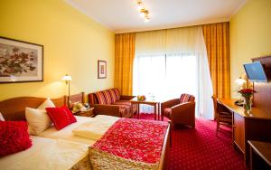 TV a/nebo společenská místnost v ubytování Hotel Konradshof