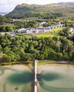 an aerial view of a resort and a lake at Mulranny Park Hotel in Mulranny