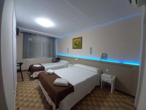 Postel nebo postele na pokoji v ubytování Hostal Sant Bernat