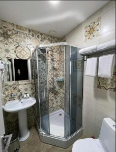 Een badkamer bij Vere Corner Hotel