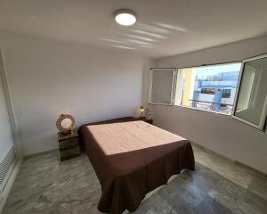 Postel nebo postele na pokoji v ubytování Exclusive penthouse in Downtown Los Cristianos