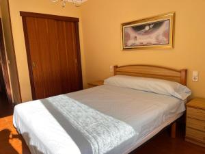 Posteľ alebo postele v izbe v ubytovaní Apartamento Edificio Cunchas