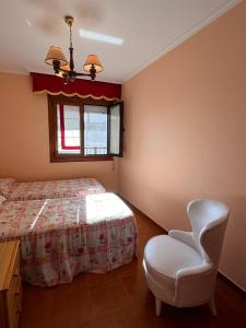 Posteľ alebo postele v izbe v ubytovaní Apartamento Edificio Cunchas