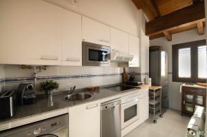 Kuchyň nebo kuchyňský kout v ubytování Apartamento La casa Mágica de Llanes