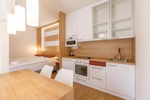 Kuchyňa alebo kuchynka v ubytovaní La Bella Centrum apartmanok Piros/Sárga