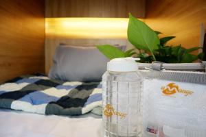 Postel nebo postele na pokoji v ubytování Amango Dorm