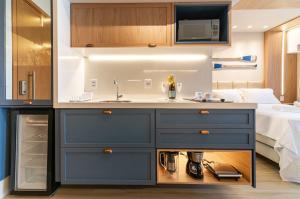 A kitchen or kitchenette at Mana Beach Experience Muro Alto por Brevelar