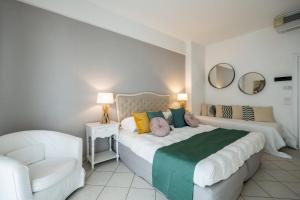Postel nebo postele na pokoji v ubytování Hotel Continental