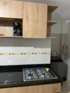 Kuchyň nebo kuchyňský kout v ubytování Bellísimos apartamentos céntricos en La Mesa