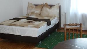 Postelja oz. postelje v sobi nastanitve Lemmerer Homestay