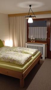 Postel nebo postele na pokoji v ubytování Ferienwohnung Schädler