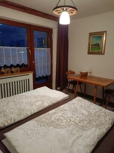 Postel nebo postele na pokoji v ubytování Ferienwohnung Schädler