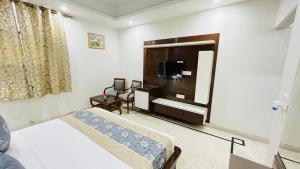 TV a/nebo společenská místnost v ubytování Hotel Starline Sector 28