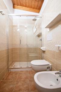 Ванна кімната в Villaggio Club Degli Ulivi