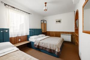 Letto o letti in una camera di Korona Hotel&SPA