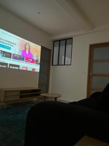 Телевизор и/или развлекательный центр в Appartment Montorgueil/Châtelet