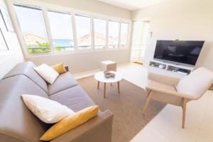 TV a/nebo společenská místnost v ubytování Eden Roc Appartements