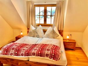 Postel nebo postele na pokoji v ubytování Chalet Mama