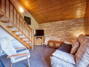 Et tv og/eller underholdning på Superbe duplex rénové 4 chambres - Centre village, proche télécabine - FR-1-642-29