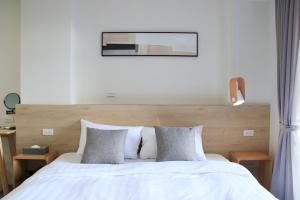 Voodi või voodid majutusasutuse 161 Easy Inn toas