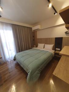 Ein Bett oder Betten in einem Zimmer der Unterkunft EUPHORIA ''Staying in Pleasure''