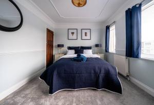 Кровать или кровати в номере Stunning 2 Bed House-Long Stay Offer-Parking