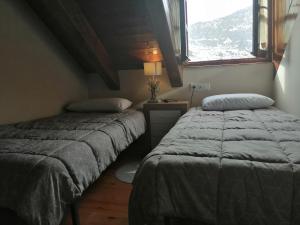 Posteľ alebo postele v izbe v ubytovaní Precioso triplex con jardín y Wifi Puig Falcó 1