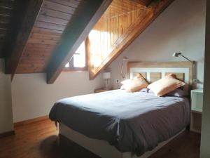 Posteľ alebo postele v izbe v ubytovaní Precioso triplex con jardín y Wifi Puig Falcó 1