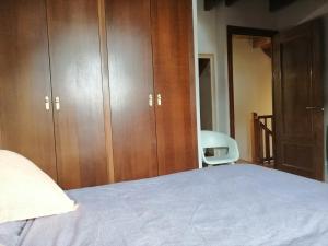 Posteľ alebo postele v izbe v ubytovaní Precioso triplex con jardín y Wifi Puig Falcó 1
