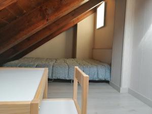 Posteľ alebo postele v izbe v ubytovaní Precioso triplex con jardín y Wifi Puig Falcó 1