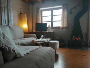 Posedenie v ubytovaní Precioso triplex con jardín y Wifi Puig Falcó 1