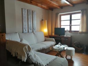 Posedenie v ubytovaní Precioso triplex con jardín y Wifi Puig Falcó 1