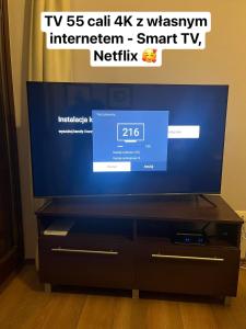 TV a/nebo společenská místnost v ubytování Pułaskiego 11A - Przestronne apartamenty, Sopot centrum