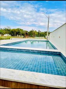 Πισίνα στο ή κοντά στο Apartamento nos Lençóis Confort