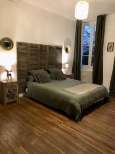 Кровать или кровати в номере Domaine de Belisle