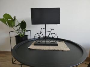 Televízia a/alebo spoločenská miestnosť v ubytovaní Skyloft Zagreb