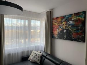 Posedenie v ubytovaní The Gatsby Apartment